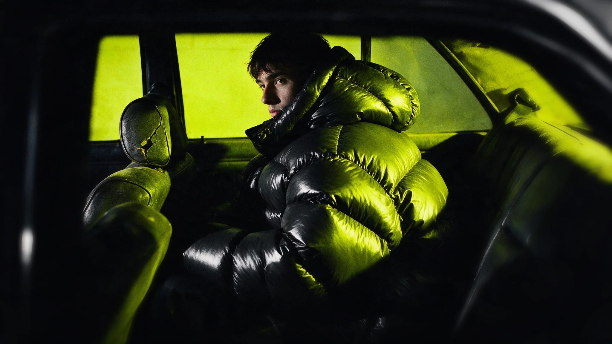 Outerwear in a car interior, one light source